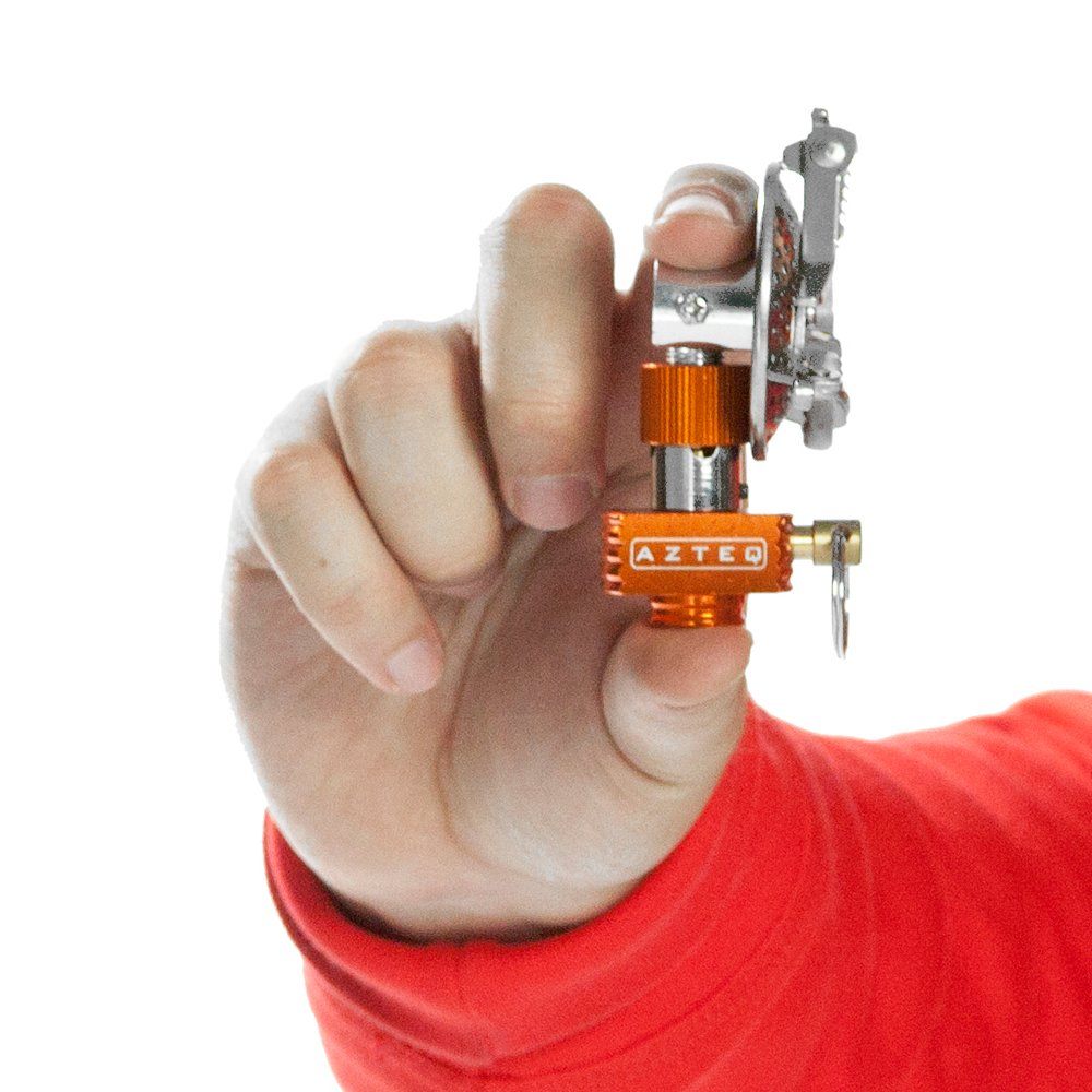 Mini fogareiro Azteq Spark com quimador reclinável para facilitar o transporte